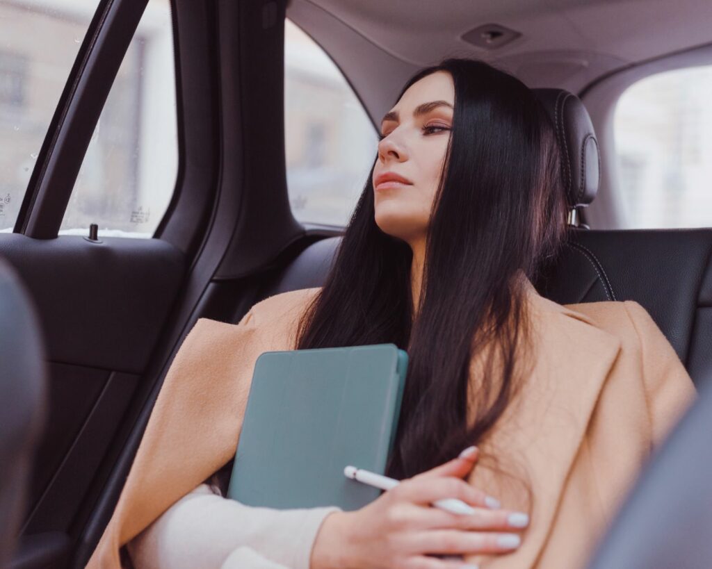 Young lady in a taxi