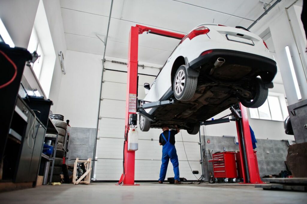 car uplifted for its maintenance