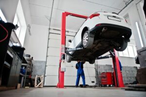 car uplifted for its maintenance