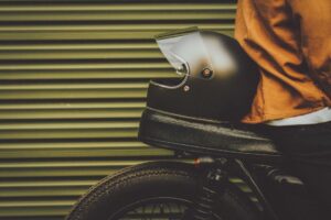 Helmet put at the back of a motorcycle