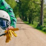 Man holding his motorcycle helmet