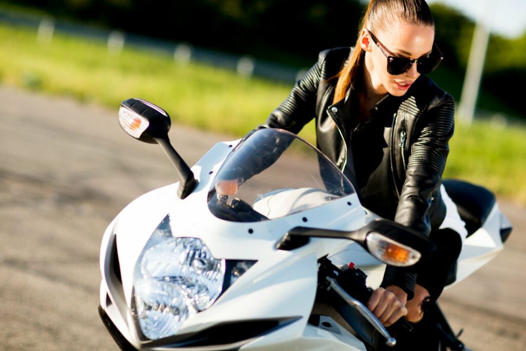 Yong woman on a motorcycle