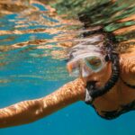 Woman snorkeling.